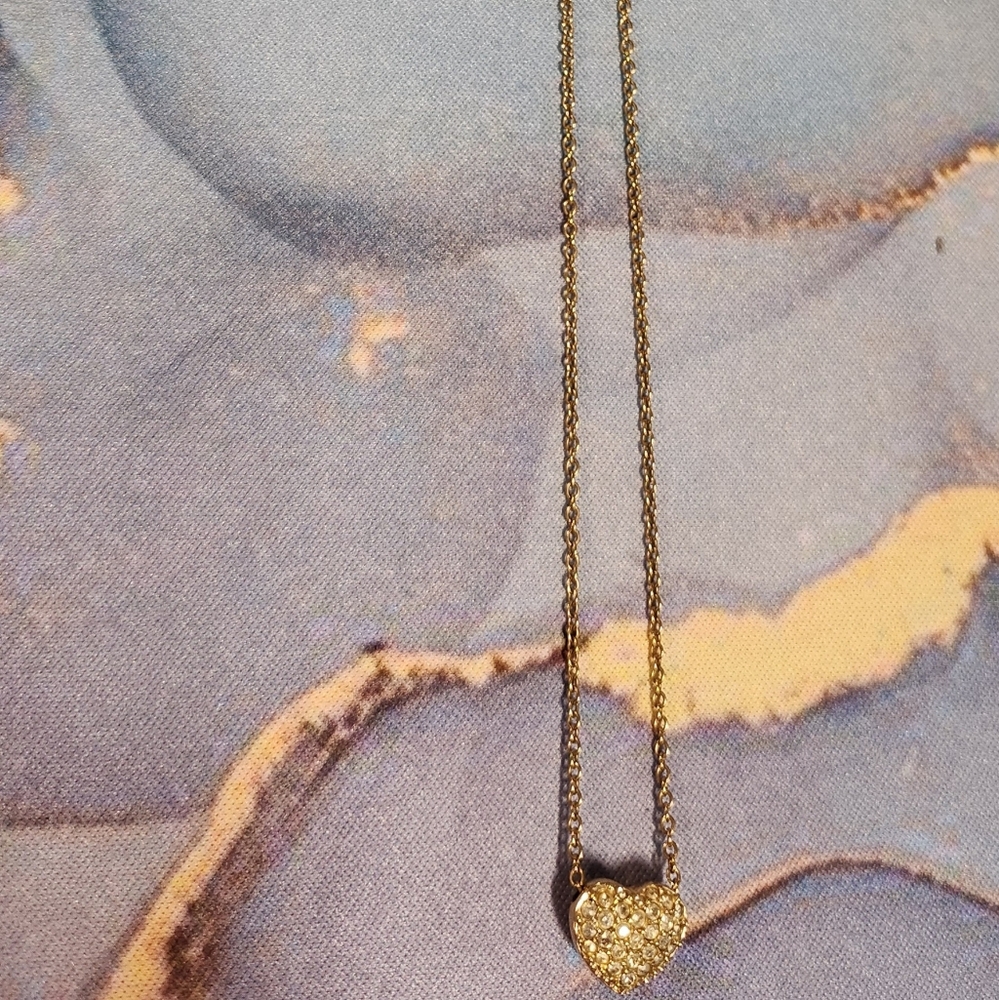 Gold Swarovski necklace with a double sided heart pendant